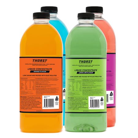 Four 2L plastic bottles of THORZ liquid concentrates in different colors, labeled as low sugar, caffeine and gluten free with proprietary electrolyte formula.