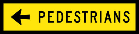 A sign with a yellow background and black text and arrow indicating the direction of pedestrian traffic.