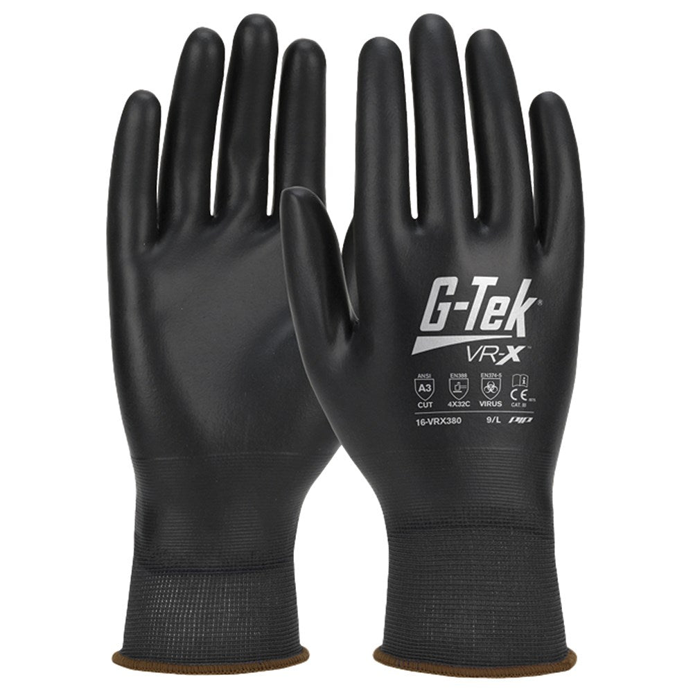 A pair of black G-Tek Polykor cut resistant gloves with a 360 liquid proof coating.