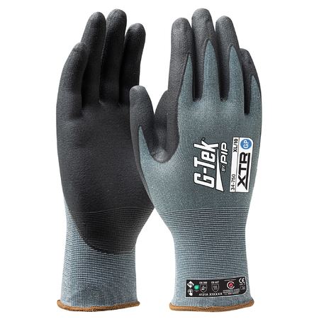 A pair of G-Tek Xtr 15G safety gloves with a nitrile foam coated palm and fingers, primarily in black and gray colors.