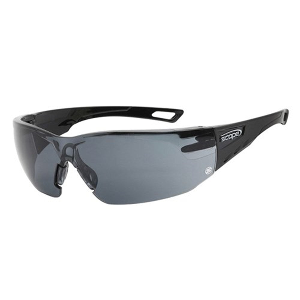 A pair of frameless, wraparound protective eyewear with smoke gray lenses and a black frame.