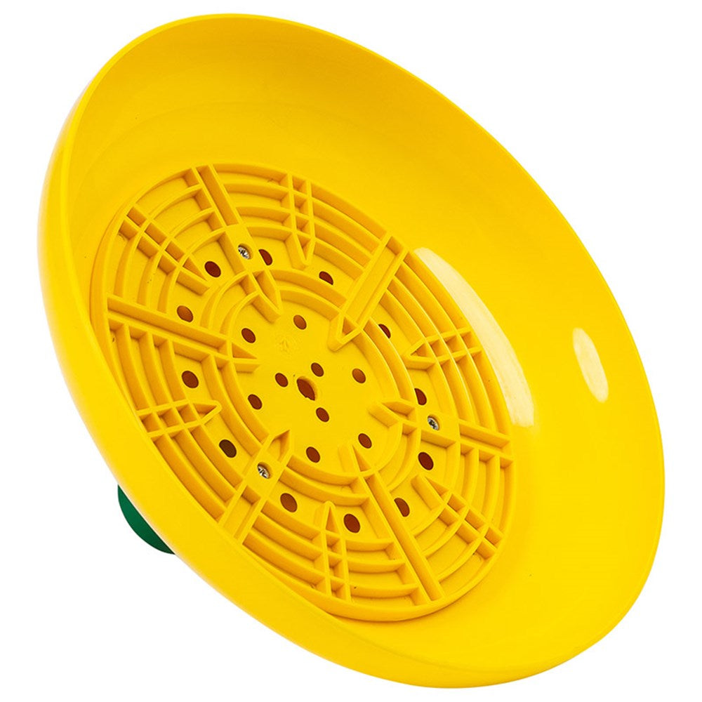 A yellow plastic shower head with an impeller for even water distribution, viewed from above with a green base visible at the bottom.