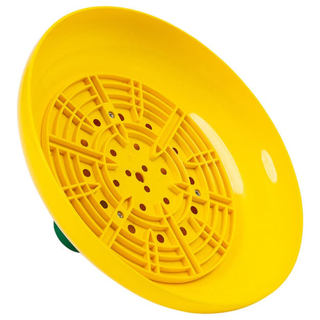 A yellow plastic shower head with an impeller for even water distribution, viewed from above with a green base visible at the bottom.