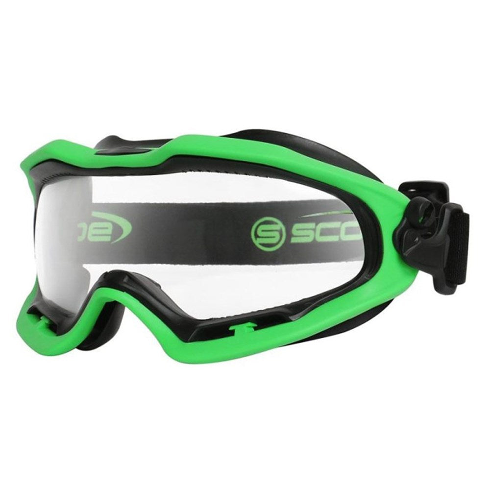A pair of SPARTAN-X brand safety goggles with a green frame and clear lens, featuring an adjustable elastic strap and a removable visor.