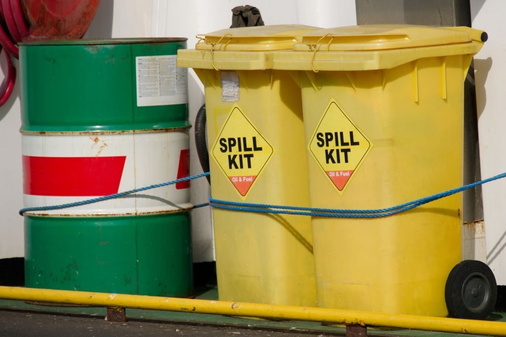 What is the difference between an oil spill kit and a chemical spill kit?